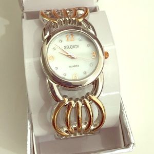 NWOT rose gold and silver bracelet cuff watch